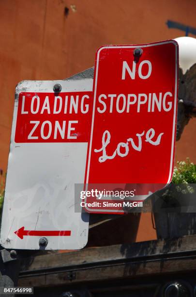 loading zone and no stopping signs in byron bay, new south wales, australia - halteverbotsschild stock-fotos und bilder