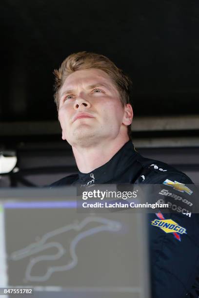 Josef Newgarden of the United States driver of the hum by Verizon Chevrolet looks on from pit lane during practice on day 1 of the GoPro Grand Prix...