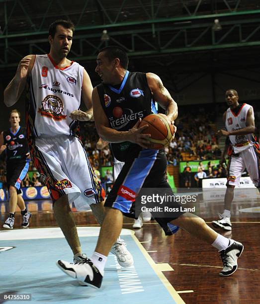 Paul Henare of the Breakers heads for the goal for goal during the round 22 NBL match between the New Zealand Taipans and the Cairns Taipans at the...
