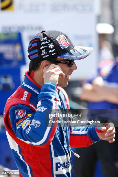 Takuma Sato of Japan driver of the Andretti Autosport Honda chats to his crew during practice on day 1 of the GoPro Grand Prix of Sonoma at Sonoma...