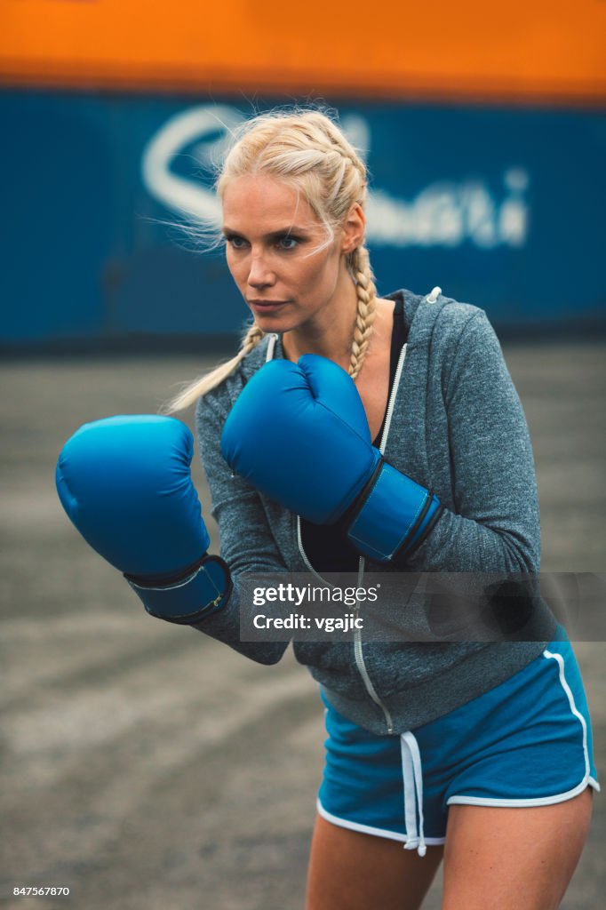 Woman shadow boxing