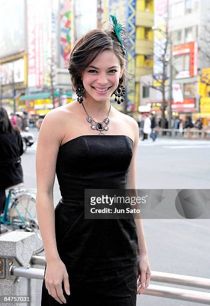 Actress Kristin Kreuk poses for photographers at Akihabara shopping street on February 12, 2009 in Tokyo, Japan. Kreuk is in Tokyo to promote her...