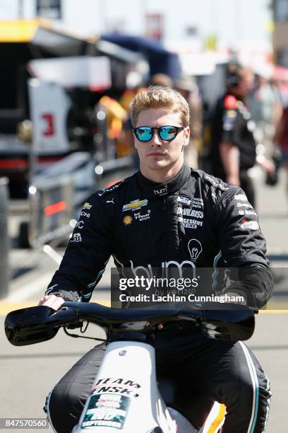 Josef Newgarden of the United States driver of the hum by Verizon Chevrolet rides to the pits during practice during on day 1 of the GoPro Grand Prix...