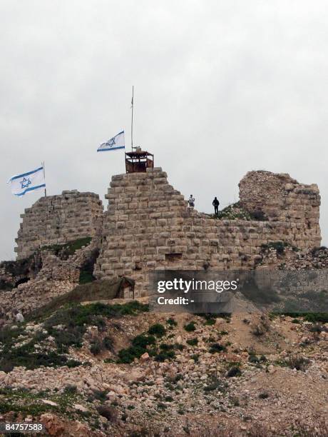 Cast and crew members of "The Living Martyr" stand at the Beaufort Castle in the southern Lebanese village of Arnun on February 9, 2009. The film,...