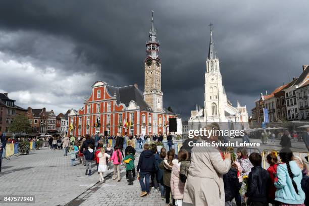 Children prepare to welcome Queen Mathilde Of Belgium on September 15, 2017 in Saint-Trond, Belgium.