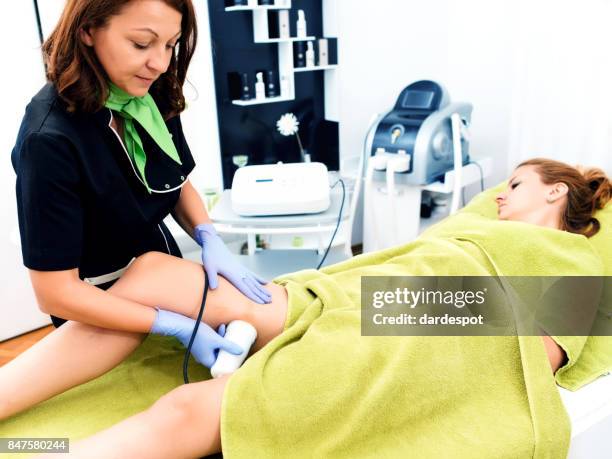 cavitation treatment - leg waxing stock pictures, royalty-free photos & images