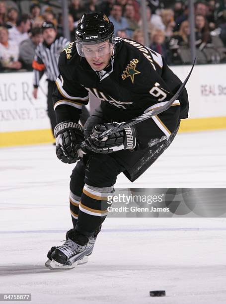 Fabian Brunnstrom of the Dallas Stars chases down the loose puck against the Phoenix Coyotes on February 11, 2009 at the American Airlines Center in...