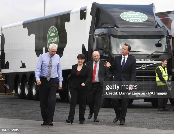 Prime Minister David Cameron walks with Leader of the Scottish Conservatives Ruth Davidson, Operations Manager Martin Mulcahy and Managing Director...