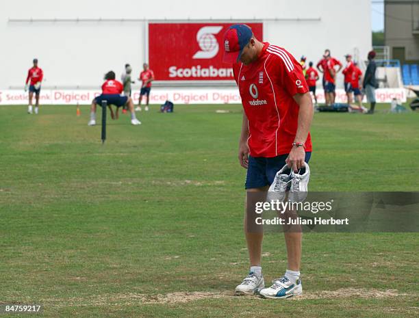 Andrew Flintoff of England looks at the outfield during a nets session at The Sir Vivian Richards Cricket Ground before the start of the 2nd Test on...