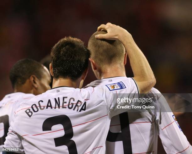 Carlos Bocanegra with Michael Bradley Of USA after Bradley had scored his second goal during a FIFA 2010 World Cup qualifying match against Mexico in...