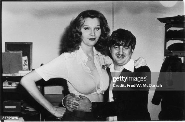 American bank robber John Wojtowicz poses with his trans girlfriend Elizabeth Debbie Eden after his release from prison for a 1972 robbery...