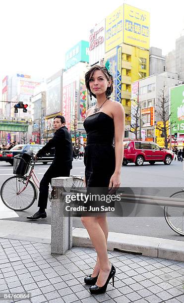 Actress Kristin Kreuk poses for photographers at Akihabara shopping street on February 12, 2009 in Tokyo, Japan. Kreuk is in Tokyo to promote her...