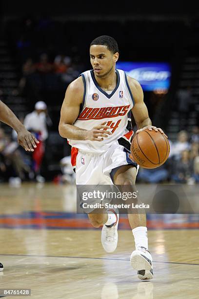 Augustin of the Charlotte Bobcats dribbles during the game against the Los Angeles Clippers at Time Warner Cable Arena on February 9, 2009 in...