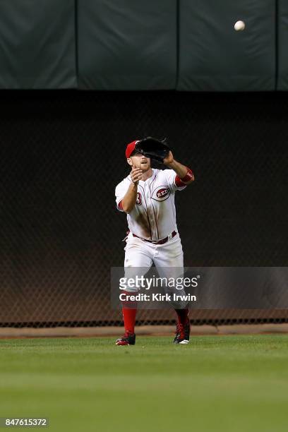 Patrick Kivlehan of the Cincinnati Reds catches a fly ball hit by Jordan Luplow of the Pittsburgh Pirates to end the game at Great American Ball Park...