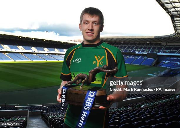 Selkirk Youth Club captain Josh Welsh with the under 18s trophy during a Photocall at Murrayfield Stadium, Edinburgh