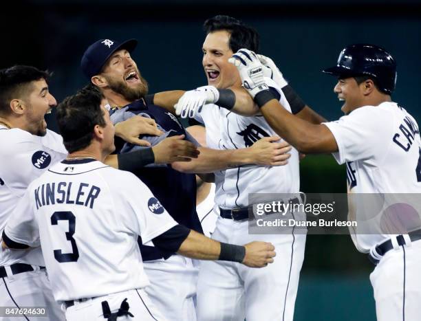 Mikie Mahtook of the Detroit Tigers celebrates with Nicholas Castellanos of the Detroit Tigers, Ian Kinsler of the Detroit Tigers, Shane Greene of...