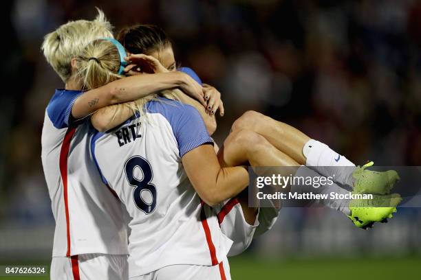 Megan Rapinoe, Julie Ertz and Kelley O'Hara of theUnited States celebrate Ertz'z second goal in the first half against New Zealand at Dick's Sporting...