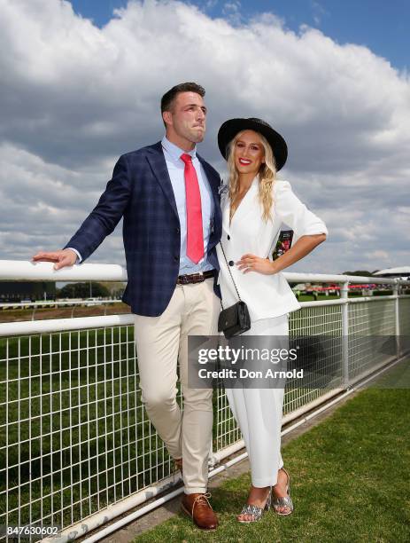 Sam Burgess and Phoebe Burgess attend Colgate Optic White Stakes Day at Royal Randwick Racecourse on September 16, 2017 in Sydney, Australia.