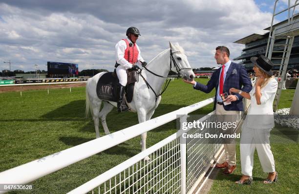 Sam Burgess and Phoebe Burgess attend Colgate Optic White Stakes Day at Royal Randwick Racecourse on September 16, 2017 in Sydney, Australia.