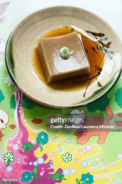 goma dofu (tofu made from ground sesame paste and kudzu powder), served with soy sauce and wasabi - wasabi paste stock pictures, royalty-free photos & images