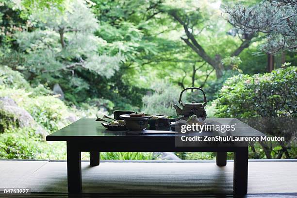 traditional japanese meal on table outdoors - 皿　和 ストックフォトと画像