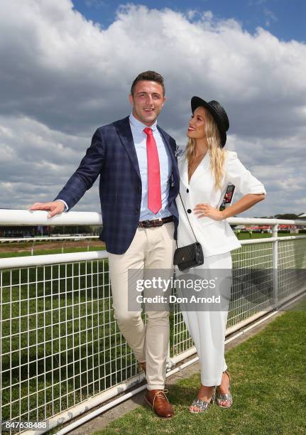 Sam Burgess and Phoebe Burgess attend Colgate Optic White Stakes Day at Royal Randwick Racecourse on September 16, 2017 in Sydney, Australia.