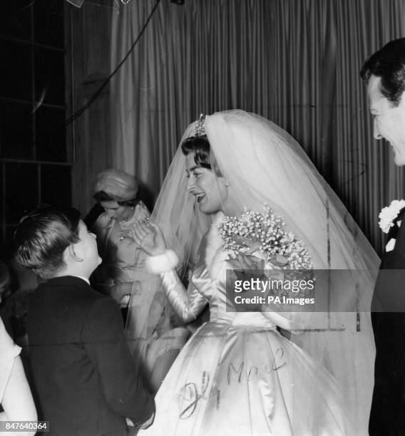 **Low-res scanned off print** Lady Pamela Mountbatten is congratulated by Prince Charles , after her wedding to David Hicks at nearby Romsey Abbey....