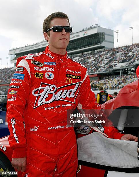 Kasey Kahne, leans on the Budweiser Dodge, prior to the NASCAR Sprint Cup Series Gatorade Duel 1 at Daytona International Speedway on February 12,...