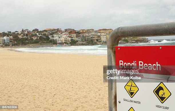 General warning sign is seen at an empty Bondi Beach on February 13, 2009 in Sydney, Australia. The beach was closed between 6am and 7.45am this...