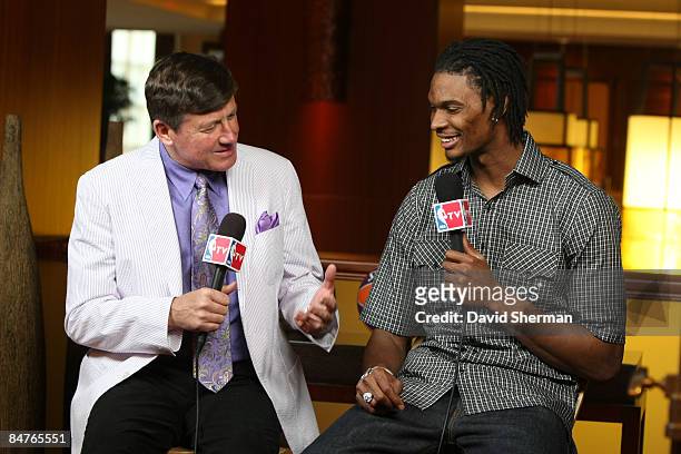Craig Sager of TNT interviews Chris Bosh of the Toronto Raptors during the All Star Media Availability as part of the 2009 NBA All-Star Weekend on...