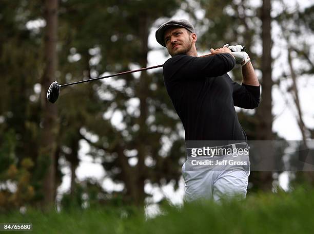 Justin Timberlake hits a tee shot on the seventh hole during the first round of the AT&T Pebble Beach National Pro-Am at the Spyglass Hill Golf...