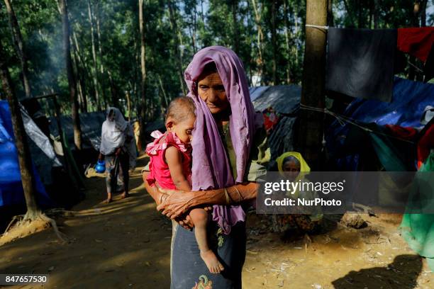 Rohingya old age woman stands close to her makeshift tent at the kutupalong camp in Ukhiya, Bangladesh 15 September 2017. Many of the Rohingya...