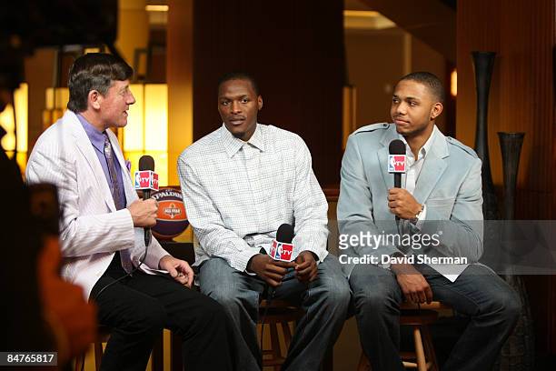 Craig Sager of TNT interviews Al Thornton and Eric Gordon of the Los Angeles Clippers during the All Star Media Availability as part of the 2009 NBA...