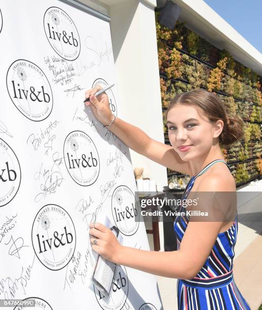 Caitlin Carmichael attends the EcoLuxe Pre-Awards Party on September 15, 2017 in Beverly Hills, California.