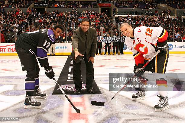 In honor of Black History Month, former NHL player Tony McKegney drops a puck at center ice with Wayne Simmonds of the Los Angeles Kings and Jarome...