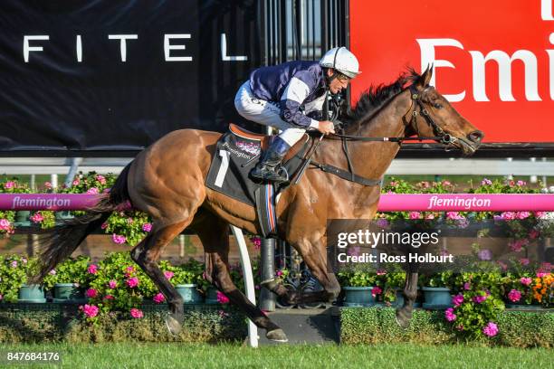 Almandin ridden by Damien Oliver wins the Japan Racing Association Trophy at Flemington Racecourse on September 16, 2017 in Flemington, Australia.