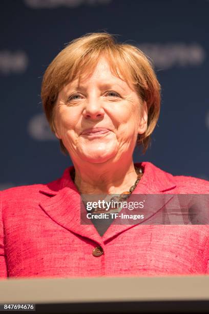 Angela Merkel looks on during an election campaign stop on September 12, 2017 in Augsburg, Germany. Merkel is seeking a fourth term in federal...