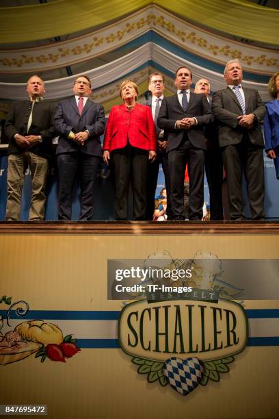 Angela Merkel looks on during an election campaign stop on September 12, 2017 in Augsburg, Germany. Merkel is seeking a fourth term in federal...