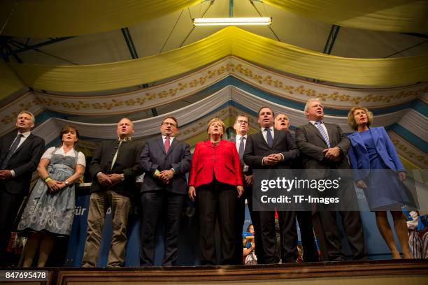 Angela Merkel looks on during an election campaign stop on September 12, 2017 in Augsburg, Germany. Merkel is seeking a fourth term in federal...