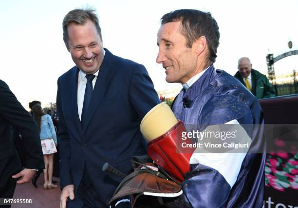 Owner Nick Williams enjoys a smile after Damien Oliver rode Almandin to win Race 8 during Melbourne Racing at Flemington Racecourse on September 16,...