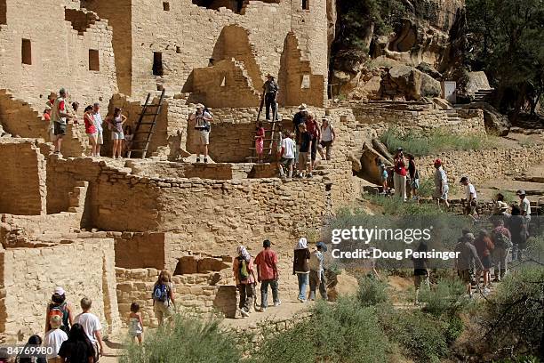 Visitors take a one hour, ticketed, ranger guided tour of Cliff Palace, Mesa Verde�s largest cliff dwelling, at Mesa Verde National Park on August 7,...