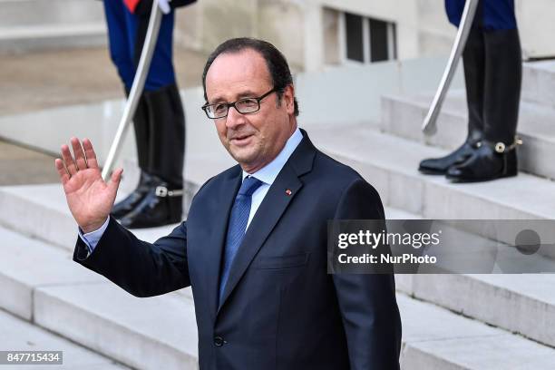 Former French president Francois Hollande arrives the Elysee Palace in Paris to a ceremony to celebrate Paris' coronation as host of the 2024...