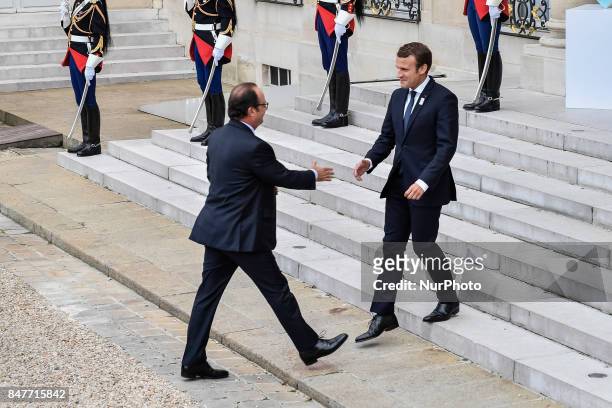 French President Emmanuel Macron welcomes former French President Francois Hollande for Paris 2024 Olympic City reception at Elysee Palace in Paris,...