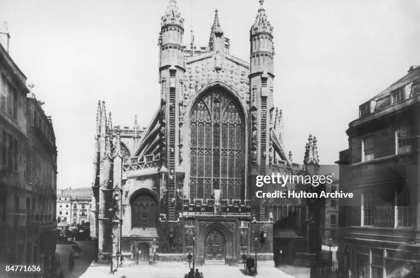 The West Front of Bath Abbey, a church in the Perpendicular Gothic style in the city of Bath, Somerset, circa 1900.