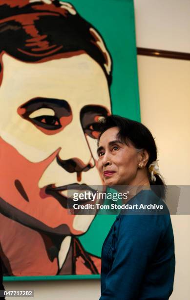 Portrait of Burmese Nobel Peace prize-winning politician Leader of the Opposition Aung San Suu Kyi as she poses in her home, Yangon , Myanmar, August...