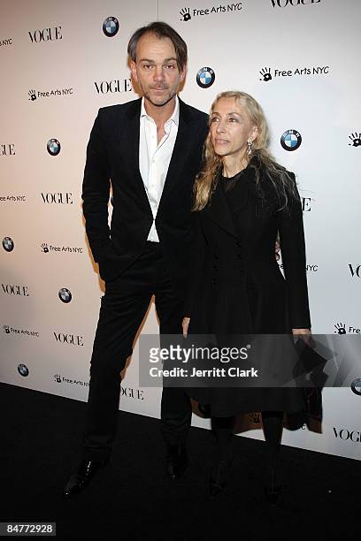 Designer Adrian van Hooydonk and Vogue Italia Editor Franca Sozzani a charity benefit cocktail party hosted by BMW & Vogue on February 12, 2009 in...