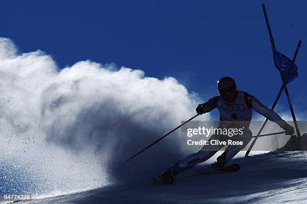 Didier Cuche of Switzerland skis during the Men's Giant Slalom event held on the Face de Bellevarde course on February 13, 2009 in Val d'Isere,...