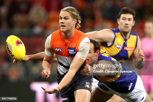 Dawson Simpson of the Giants handpasses during the AFL First Semi Final match between the Greater Western Sydney Giants and the West Coast Eagles at...