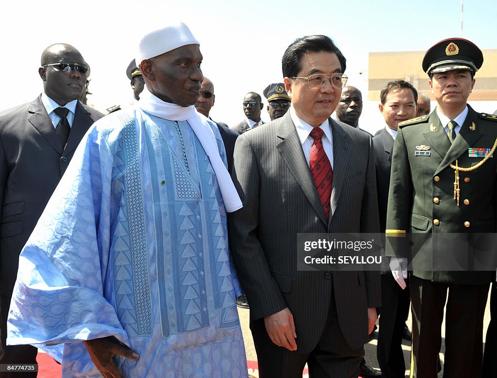 Chinese president Hu Jintao walks with S