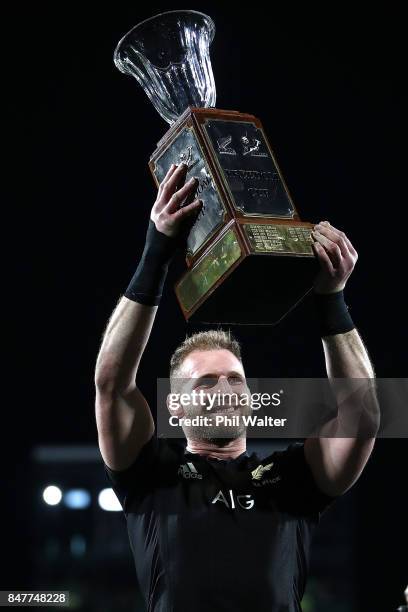 Kieran Read of the All Blacks holds up the Freedom Cup following the Rugby Championship match between the New Zealand All Blacks and the South...